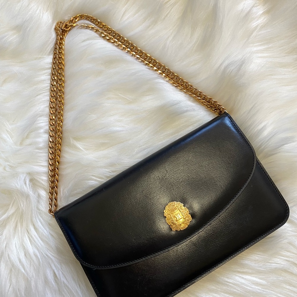Authentic vintage Celine black leather clutch with chain